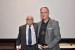 Dr. Nagib Callaos, General Chair, giving Dr. Robert Cherinka an award "In Appreciation for Delivering a Great Keynote Address at a Plenary Session."